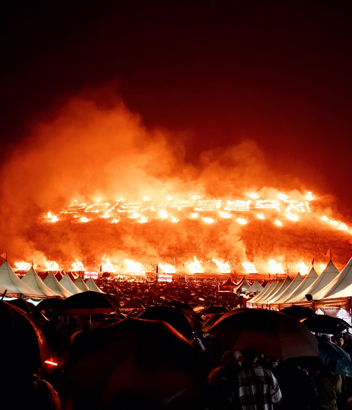 Brandwacht overseeing safety at a large outdoor festival.